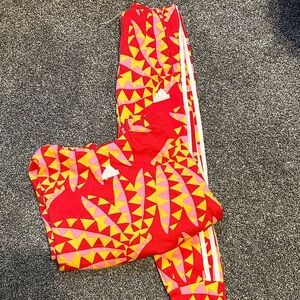 Girls Adidas track set, size 7-8Y kept in good condition.